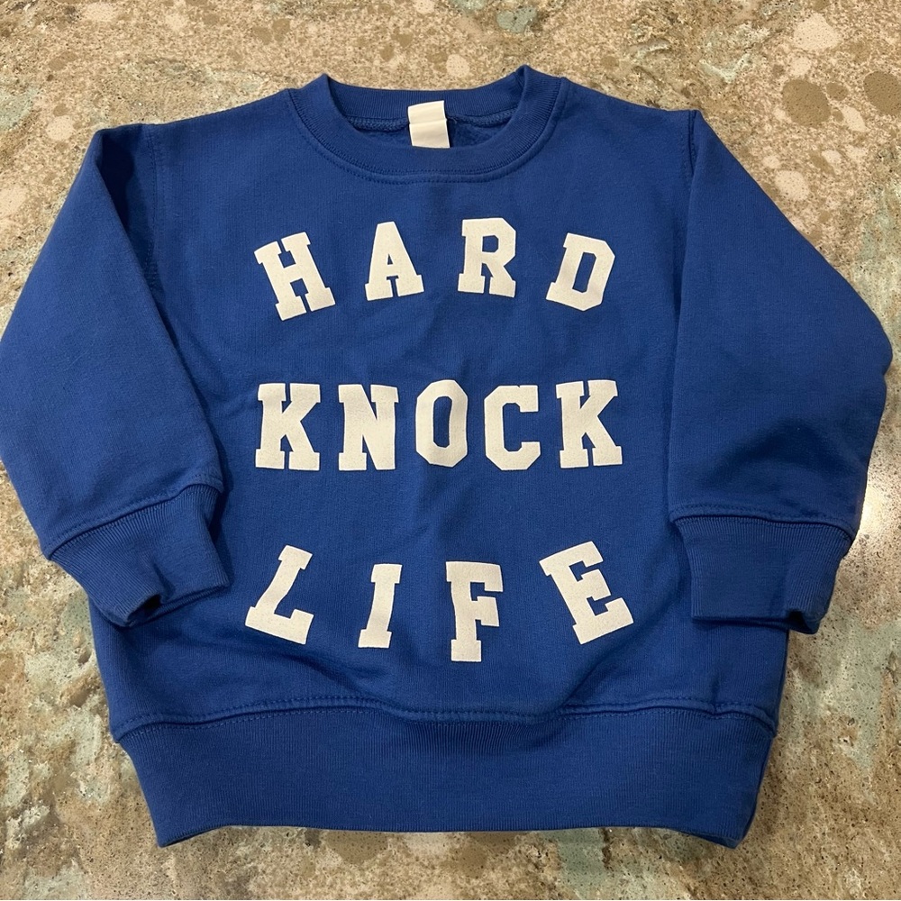 Trilogy Design Co Hard Knock Life Sweater